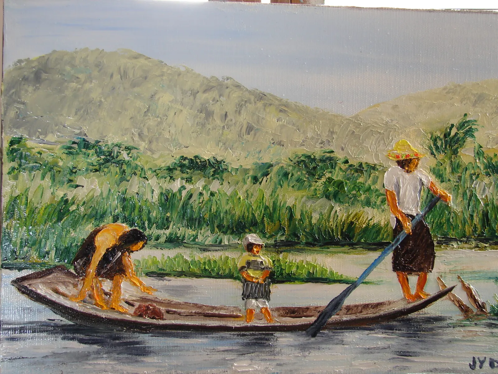 Birmanie :  la famille en pirogue